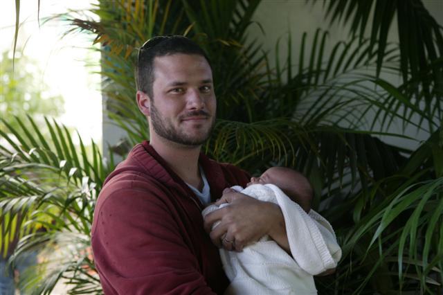  Jesse holding his niece and Phil's granddaughter Cady, approximately 1013